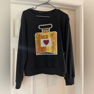 Black Sweatshirt with Gold Perfume Bottle Design